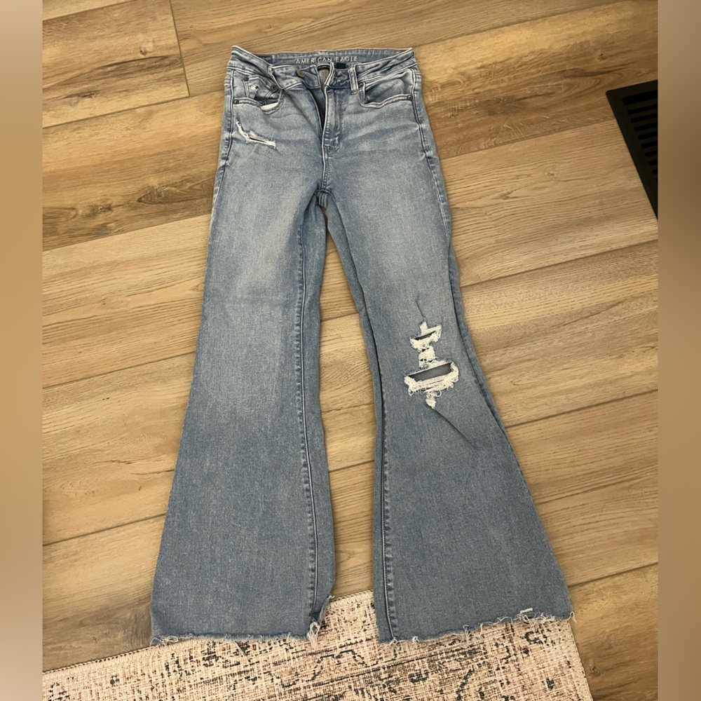 American Eagle Outfitters Super High Rise Distressed Flare Jeans; 4 X-Short
